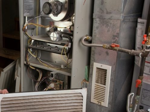 A residential furnace showing the inducer motor, explained by Element Air Heating and Cooling. Learn what a furnace inducer motor is, common furnace problems, repair and replacement services, and maintenance tips for safe, efficient heating. Contact us today for help with what is the inducer motor on a furnace, furnace inducer motor repair, furnace inducer motor replacement, furnace inducer motor problems, furnace inducer motor not working, furnace inducer motor troubleshooting, furnace repair near me, HVAC repair near me, heating system maintenance, furnace maintenance service, furnace repair service, furnace installation, heating repair near me, residential furnace service, commercial furnace repair, furnace inspection, high-efficiency furnace repair, emergency furnace repair, furnace blower motor issues, furnace safety switch repair, furnace airflow problems.